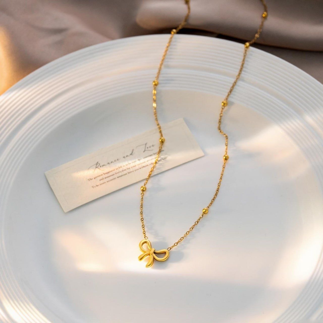GOLDEN BOW PENDANT - Image 2