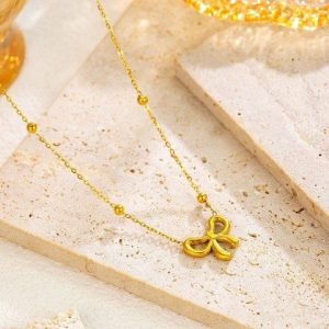 GOLDEN BOW PENDANT