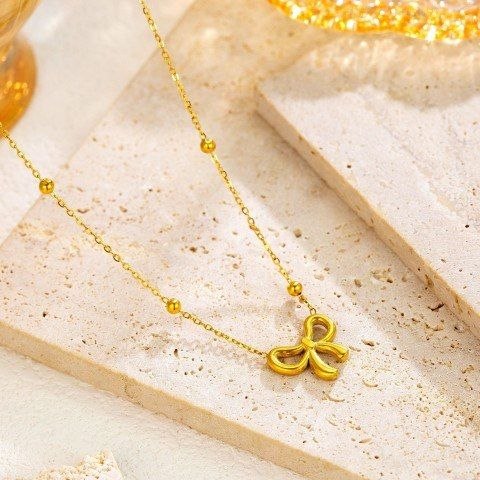 GOLDEN BOW PENDANT